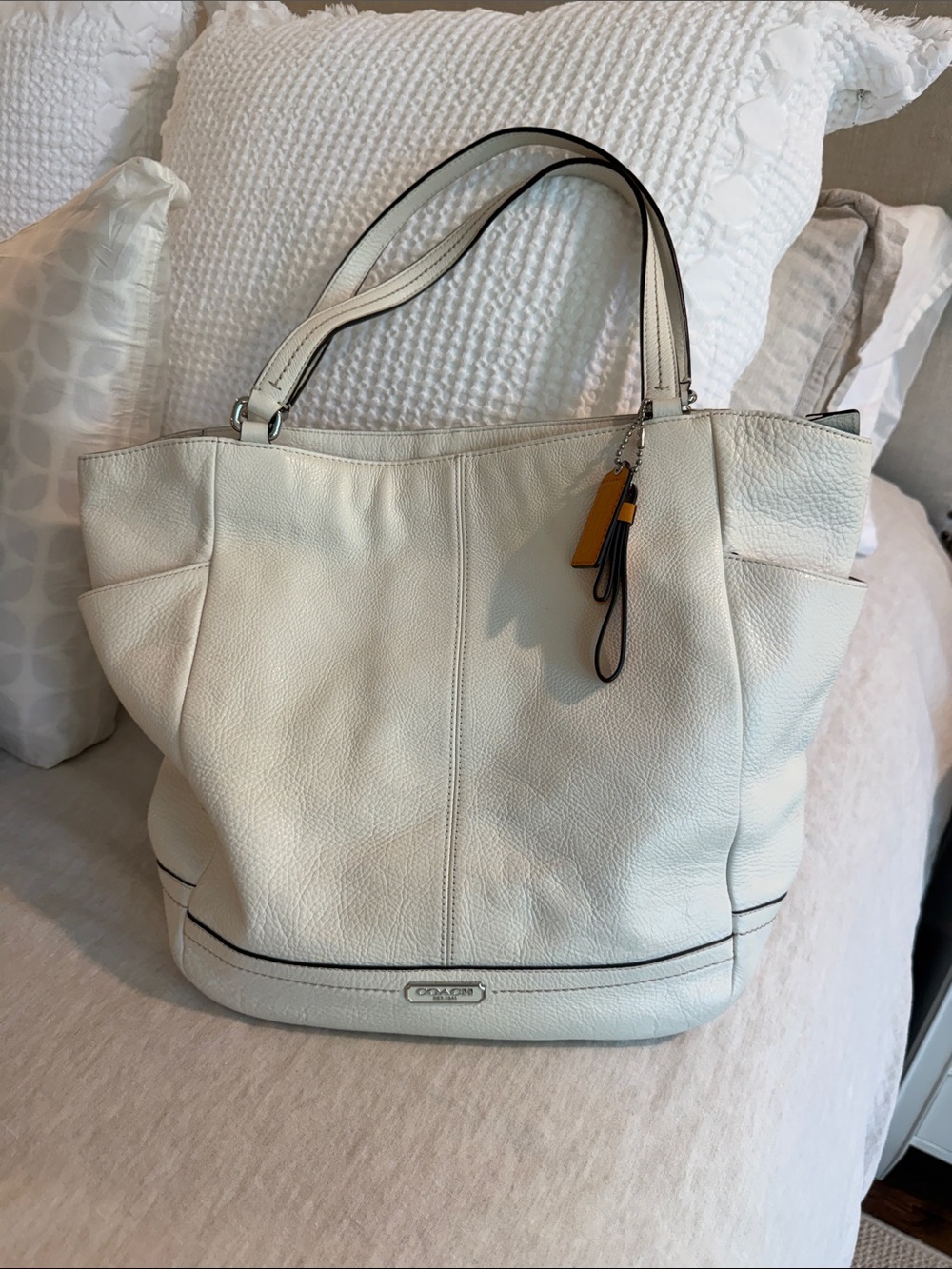 Coach Cream Pebbled Leather Tote with Yellow Charm